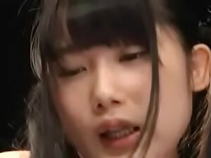 Off colour Asian cosset having fun